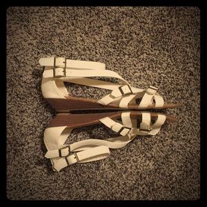 White sandal with small wedge heel